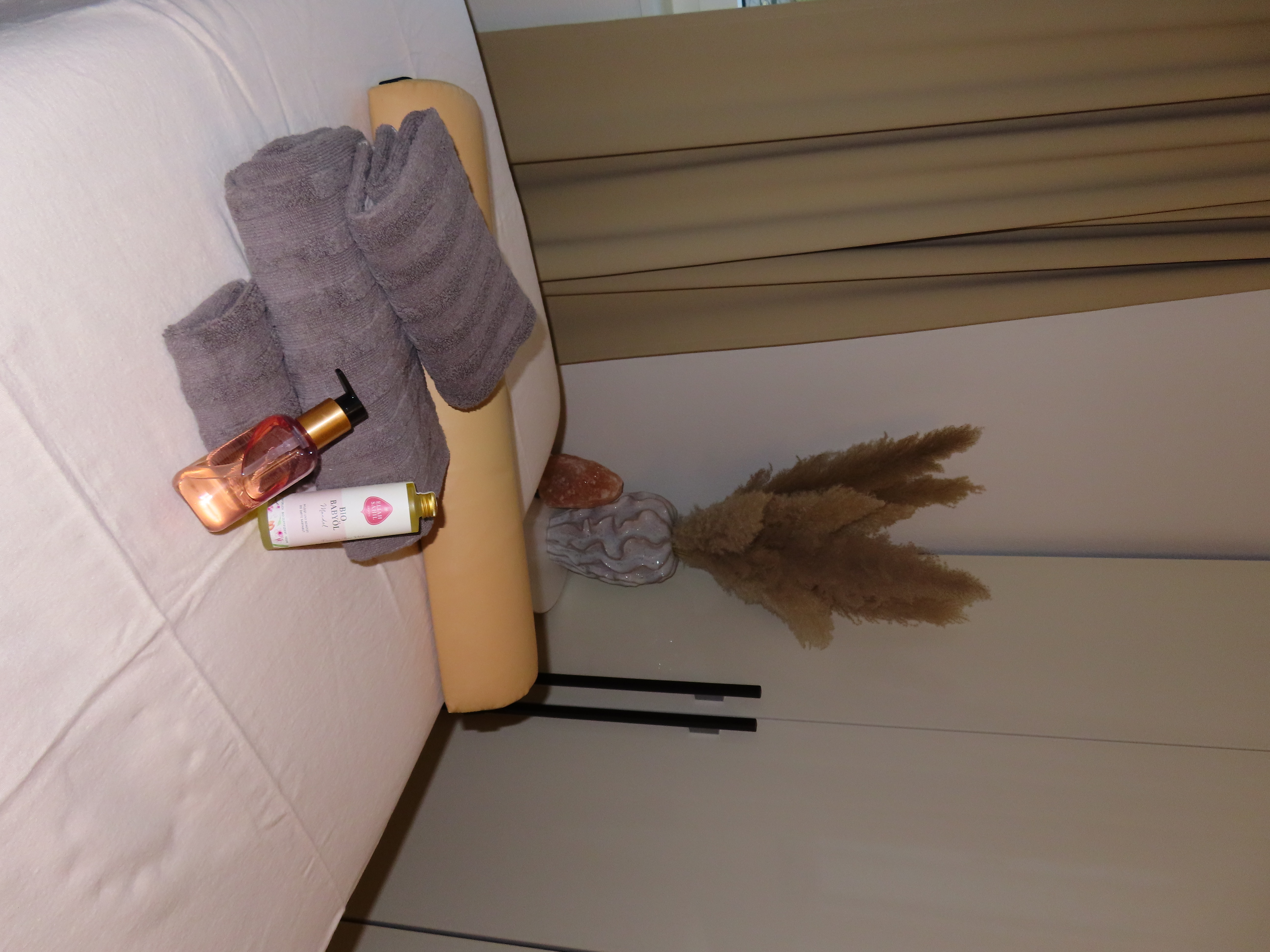 Outdoor yoga session with group on mats